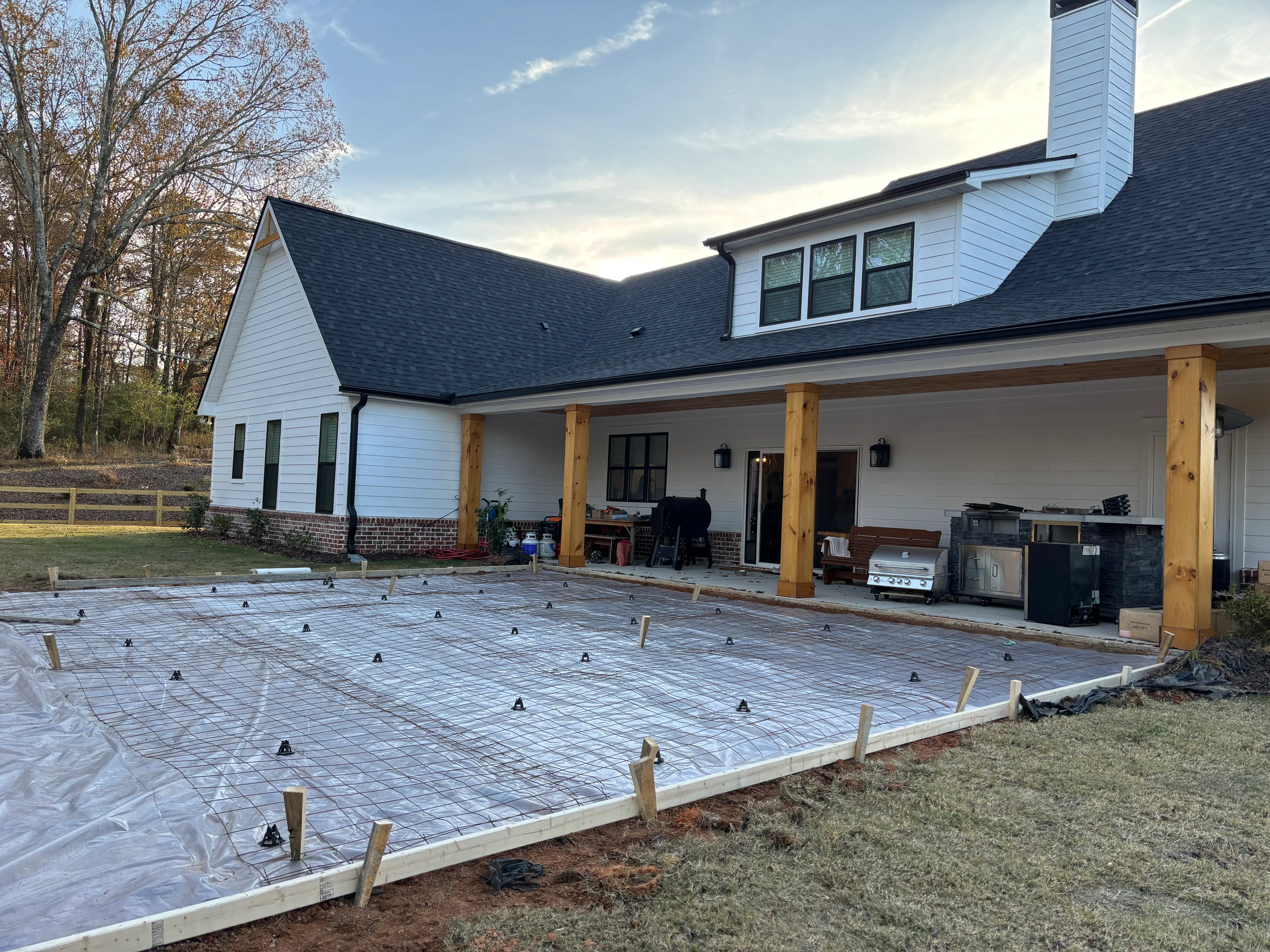 Steel welded support posts and framework for residential patio construction